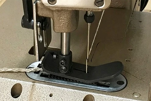 Bottom feed mechanism Bottom feed mechanism